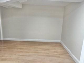 16 Fowler St, Boston, MA 02121 - unfurnished room featuring light wood-type flooring and baseboards