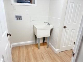 16 Fowler St, Boston, MA 02121 - bathroom featuring wood finished floors and baseboards