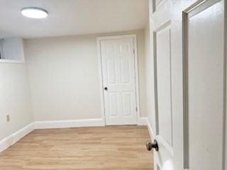 16 Fowler St, Boston, MA 02121 - washroom featuring light wood-type flooring and baseboards