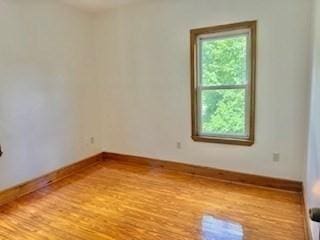 16 Fowler St, Boston, MA 02121 - unfurnished room featuring wood finished floors and baseboards