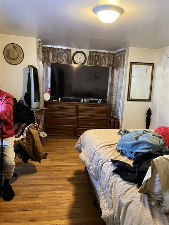 bedroom featuring hardwood / wood-style flooring