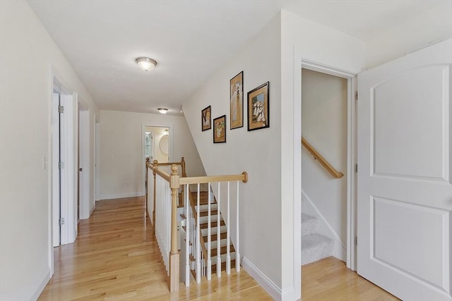 6 Beacon Ct, Acton, MA 01720 - corridor with light wood finished floors and baseboards