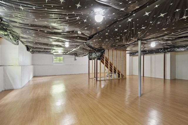 6 Beacon Ct, Acton, MA 01720 - basement with wood finished floors