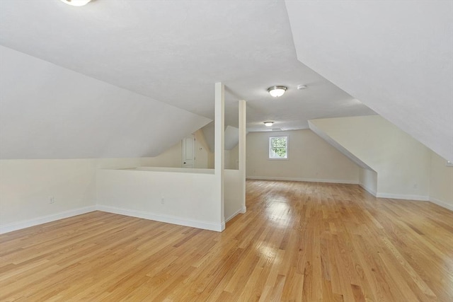 6 Beacon Ct, Acton, MA 01720 - bonus room with light wood-type flooring, vaulted ceiling, and baseboards