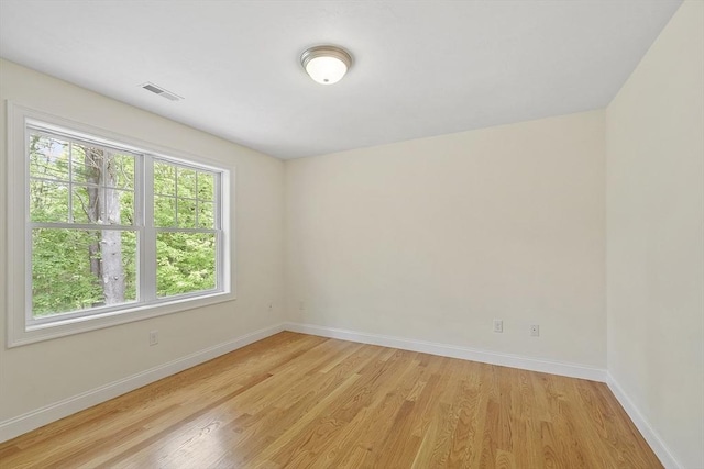 6 Beacon Ct, Acton, MA 01720 - spare room featuring light wood-style flooring and baseboards