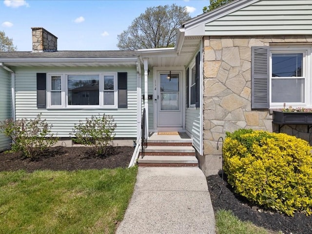 114 Hobart St, Braintree, MA 02184 - view of exterior entry with stone siding and a chimney