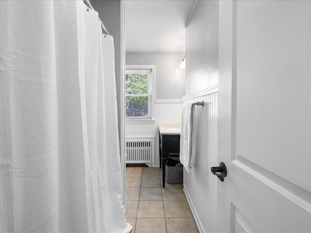 114 Hobart St, Braintree, MA 02184 - bathroom with vanity, tile patterned floors, and radiator heating unit