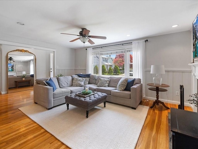 114 Hobart St, Braintree, MA 02184 - living area featuring light wood finished floors, wainscoting, and a ceiling fan