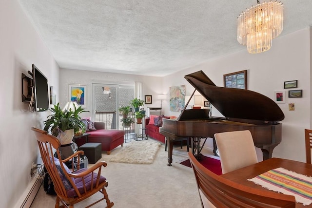 sitting room featuring a baseboard radiator, carpet flooring, a chandelier, and a textured ceiling