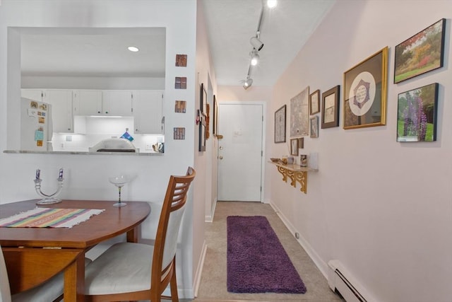 entryway with a baseboard radiator