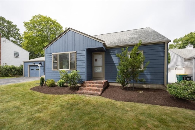 23 Crescent Ave, North Attleboro, MA 02760 - ranch-style house with a front lawn and a detached garage