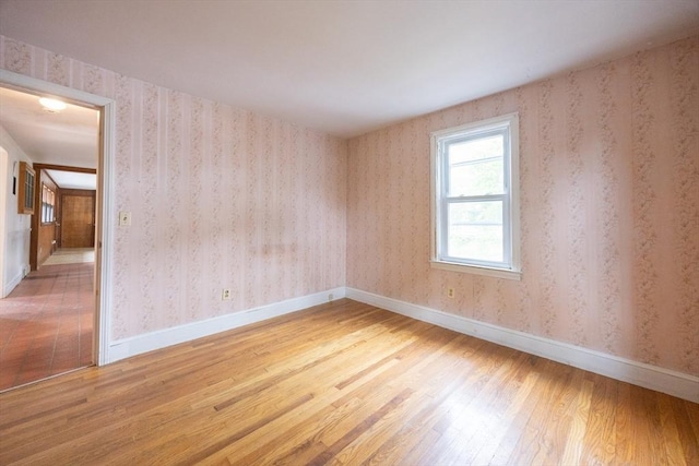 23 Crescent Ave, North Attleboro, MA 02760 - spare room with light wood-style floors and baseboards