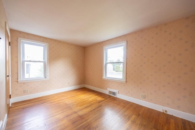 23 Crescent Ave, North Attleboro, MA 02760 - spare room with light wood-style floors and baseboards