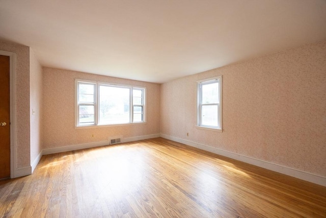 23 Crescent Ave, North Attleboro, MA 02760 - unfurnished room with healthy amount of natural light and wood finished floors