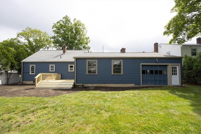 23 Crescent Ave, North Attleboro, MA 02760 - rear view of house featuring a chimney, a yard, a garage, and a deck