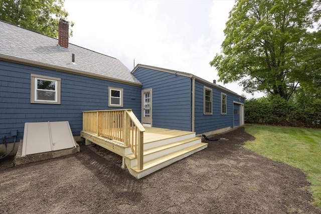 23 Crescent Ave, North Attleboro, MA 02760 - back of property with a wooden deck, a chimney, a lawn, and a shingled roof