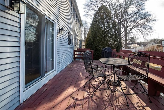 deck featuring outdoor dining space