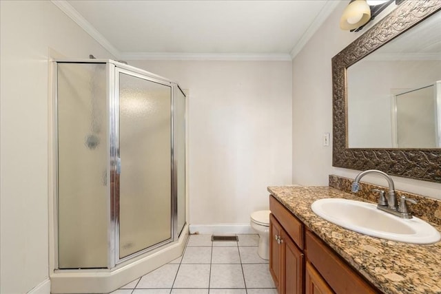 bathroom featuring crown molding, vanity, a stall shower, and tile patterned floors