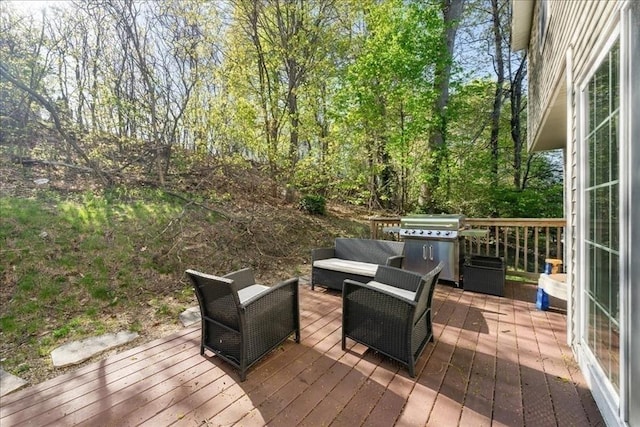 wooden deck featuring outdoor lounge area