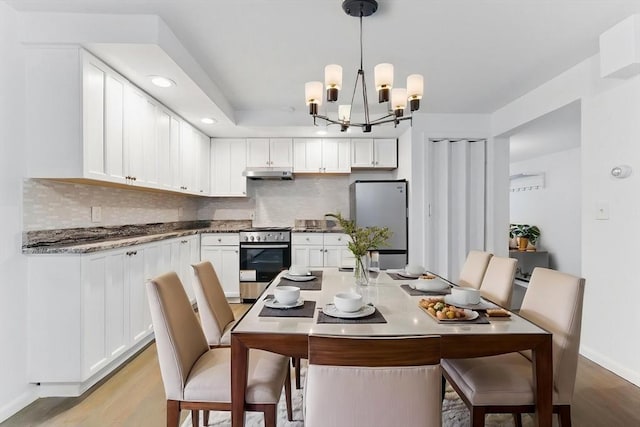 57 Brighton Ave Unit A, Boston, MA 02134 - dining room with a chandelier, light wood-style floors, baseboards, and recessed lighting