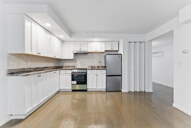 57 Brighton Ave Unit A, Boston, MA 02134 - kitchen with stainless steel appliances, wood finished floors, baseboards, under cabinet range hood, and a sink