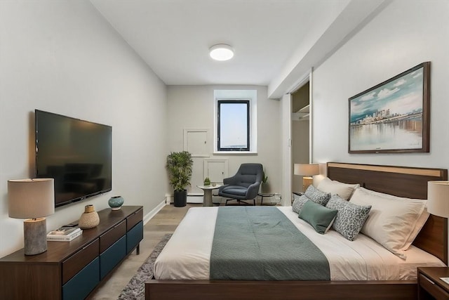 57 Brighton Ave Unit A, Boston, MA 02134 - bedroom with light wood-style flooring and baseboards