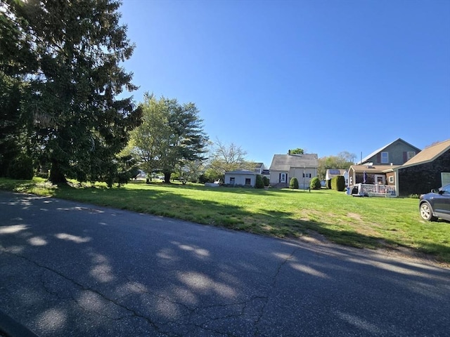 view of front of home with a front lawn
