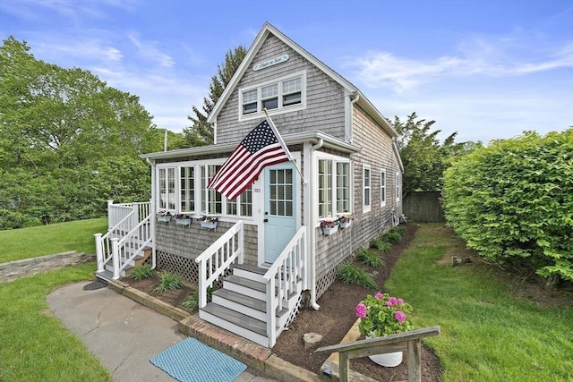 323 N Main St, Cohasset, MA 02025 - view of front of property featuring a front yard and a wooden deck