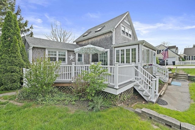 323 N Main St, Cohasset, MA 02025 - rear view of house featuring a deck and roof with shingles