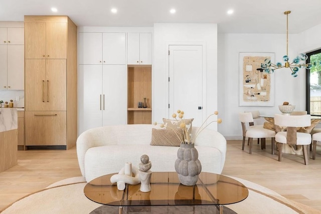 1597 Centre St Unit 2, Newton, MA 02461 - living area featuring light wood finished floors, recessed lighting, and baseboards