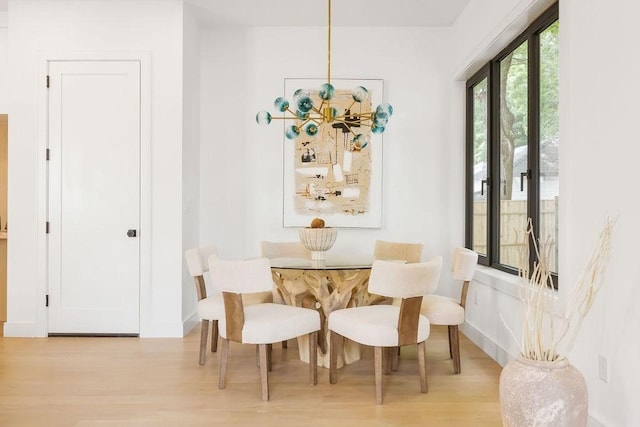 1597 Centre St Unit 2, Newton, MA 02461 - dining room with light wood-style floors and baseboards