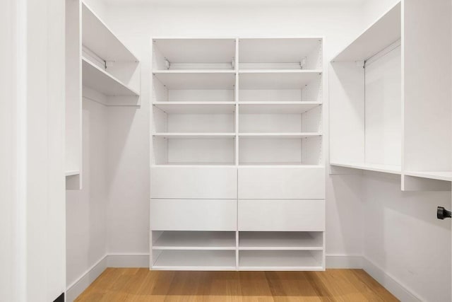 1597 Centre St Unit 2, Newton, MA 02461 - spacious closet with wood finished floors
