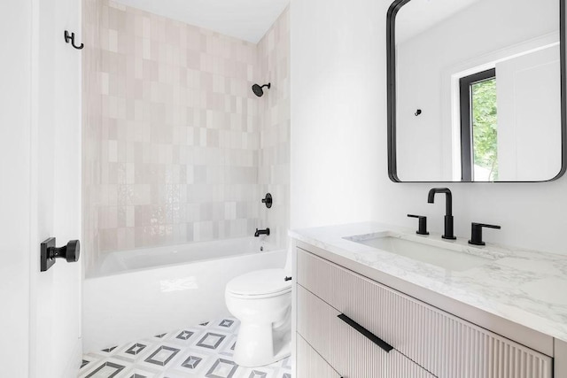 1597 Centre St Unit 2, Newton, MA 02461 - bathroom with vanity, toilet, shower / washtub combination, and tile patterned floors