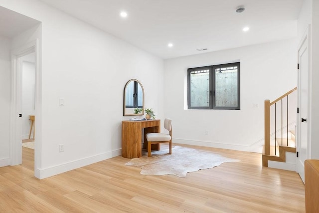 1597 Centre St Unit 2, Newton, MA 02461 - entrance foyer featuring light wood-style floors, stairs, recessed lighting, baseboards, and french doors