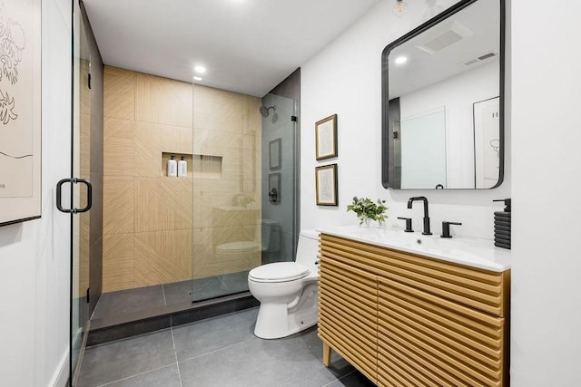 1597 Centre St Unit 2, Newton, MA 02461 - bathroom with toilet, vanity, a stall shower, tile patterned floors, and recessed lighting
