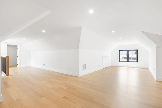 1597 Centre St Unit 2, Newton, MA 02461 - additional living space featuring vaulted ceiling, light wood-type flooring, recessed lighting, and baseboards