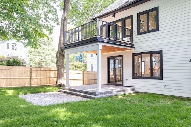 1597 Centre St Unit 2, Newton, MA 02461 - rear view of house with a balcony and a patio
