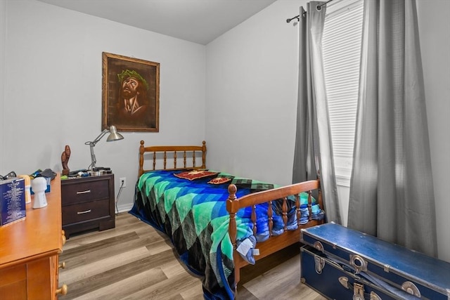 bedroom featuring hardwood / wood-style flooring