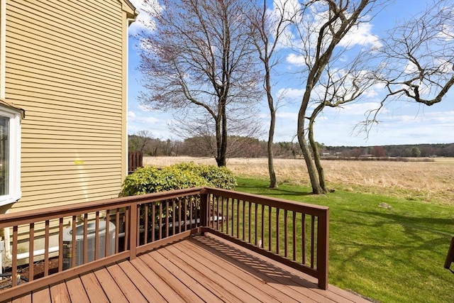 deck featuring a lawn