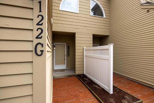 property entrance featuring fence