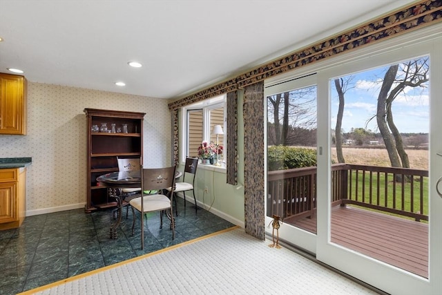 dining space featuring baseboards, recessed lighting, and a desk