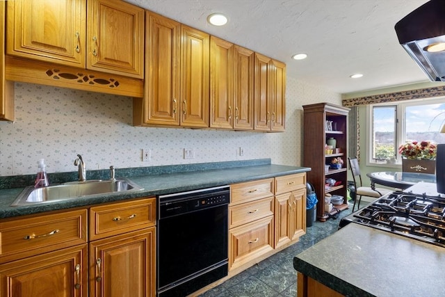 kitchen with dishwasher, a sink, wallpapered walls, dark countertops, and brown cabinetry