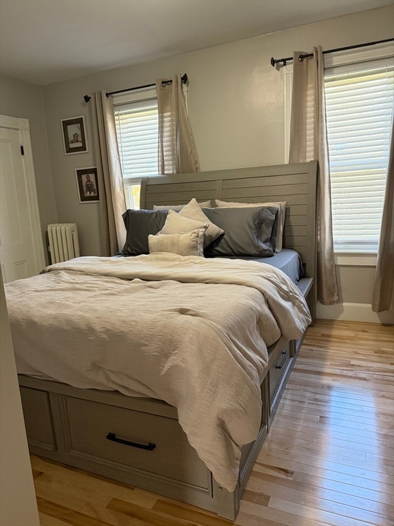 bedroom with light wood-type flooring