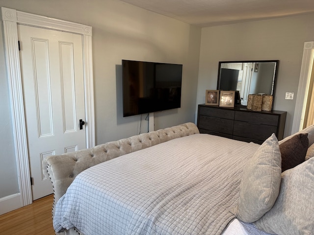 bedroom with light hardwood / wood-style flooring