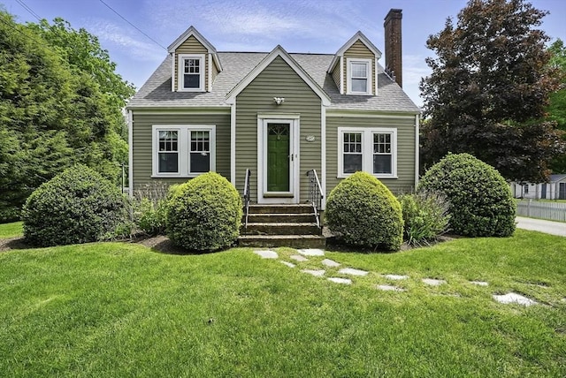 247 S St, Wrentham, MA 02093 - cape cod house featuring a chimney, a front yard, entry steps, and a shingled roof