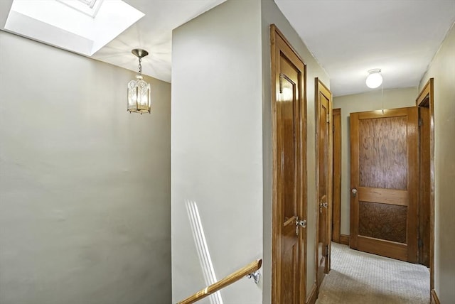 247 S St, Wrentham, MA 02093 - hall with a skylight, carpet flooring, and a chandelier