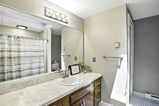247 S St, Wrentham, MA 02093 - full bathroom featuring a baseboard heating unit, vanity, and baseboards