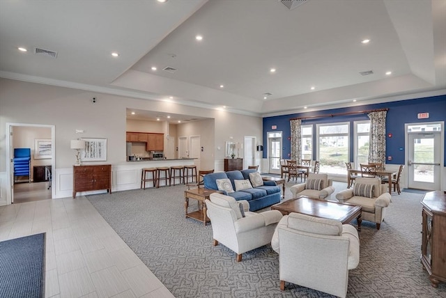 6 Overlook Dr Unit 207, Andover, MA 01810 - living area with a wainscoted wall, a tray ceiling, visible vents, and recessed lighting