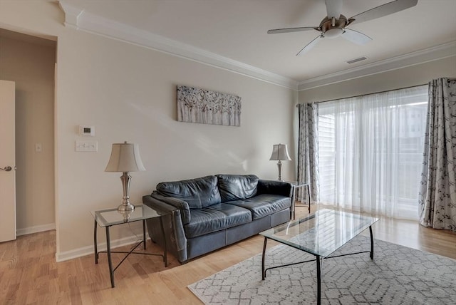 6 Overlook Dr Unit 207, Andover, MA 01810 - living room featuring ornamental molding, visible vents, ceiling fan, and wood finished floors