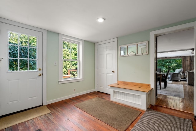 interior space with dark wood-type flooring